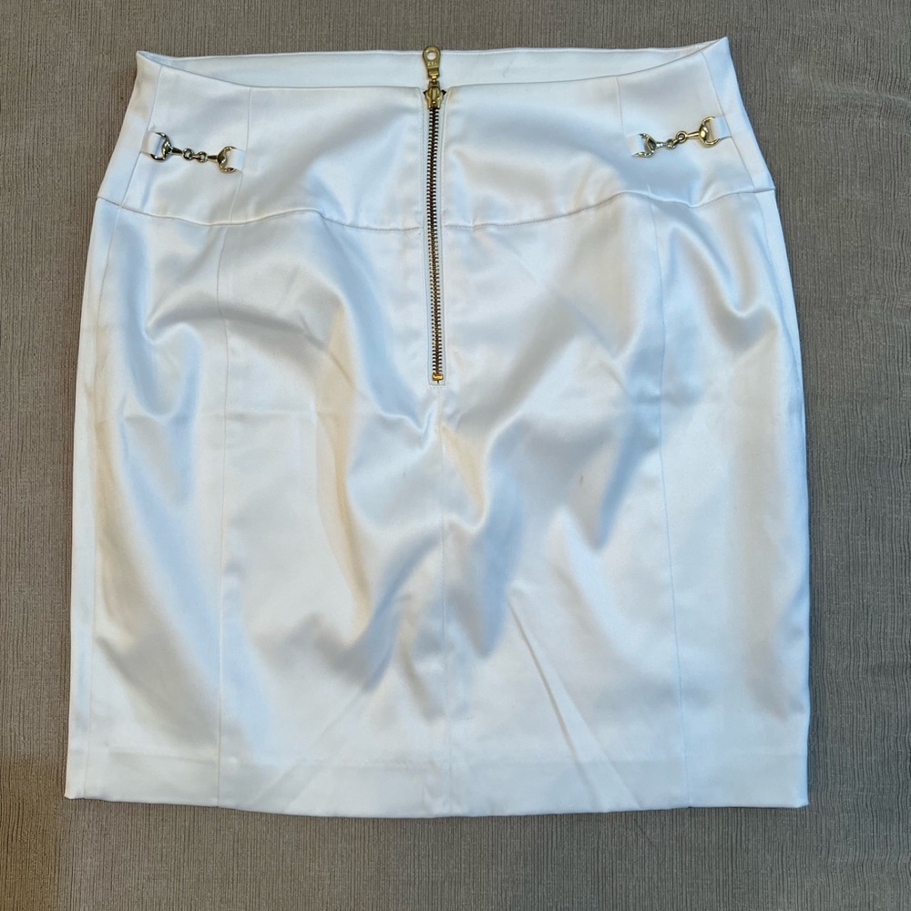 Express skirt silky material with gold chain  not sold in store is unique
